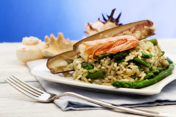 light risotto with asparagus, razor shell and prawn