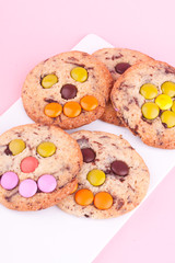 face on chocolate chip cookie