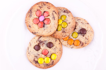 face on chocolate chip cookie