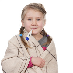 Sick child with a thermometer