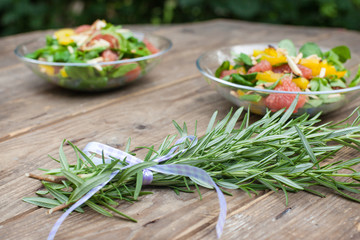 Fresh salad with with bunch rosemary