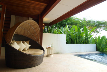 armchair on luxury resort terrace