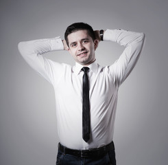  man holding hands behind his head