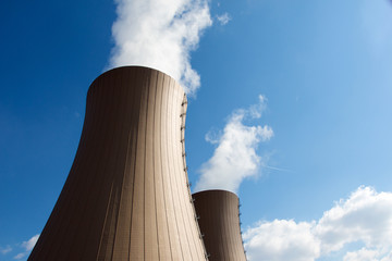 Nuclear power plant against  clouds and sky