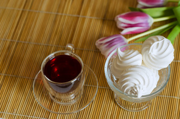 meringues, red tea and tulips