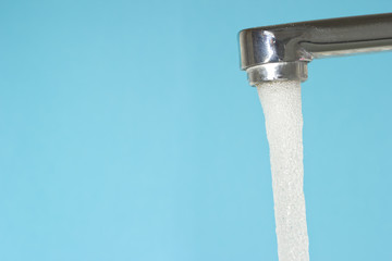 Water flowing from the tap