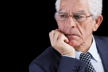 Senior businessman thinking