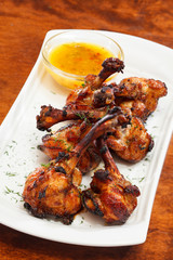 Chicken wings with sauce
