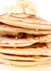 Pancakes with bananas and syrop