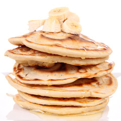 Pancakes with bananas and syrop