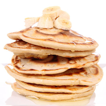 Pancakes with bananas and syrop