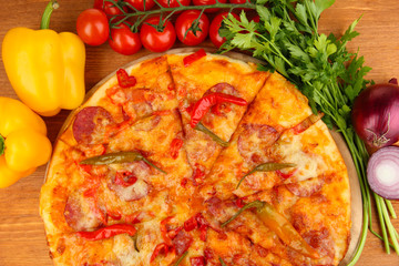 Tasty pepperoni pizza with vegetables