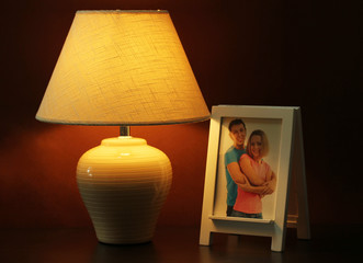 White photo frame and lamp