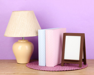 Brown photo frame and lamp