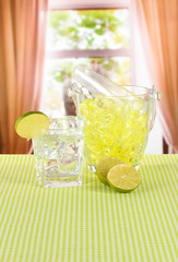 Ice in the bucket on bright background