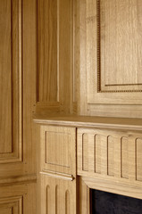 detail of fireplace mantle and wall in wood