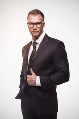 businessmanman in black suit and glasses