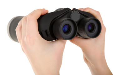 Black modern binoculars in hands isolated on white