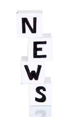 White paper cubes labeled 
