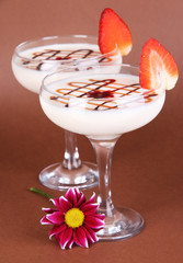 Fruit smoothies on brown background