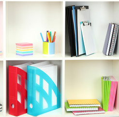 Obraz na płótnie Canvas White office shelves with different stationery, close up