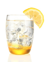 Glass with water and ice isolated on white