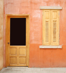 Fototapeta na wymiar vintage door and window on wall background