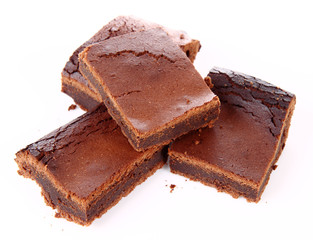 Slices of a brownie on white background