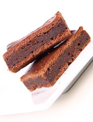 Slices of a brownie on a plate