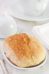 bread on white dish and white cup