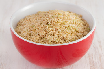 dry rice in red bowl