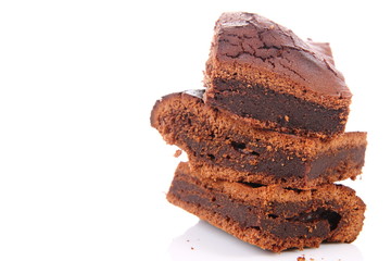 Slices of a brownie on white background
