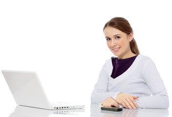 Woman sitting on the desk with laptop