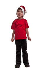 little boy in Santa hat sticking tongue