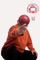 man with basketball instead of head near a basketball hoop
