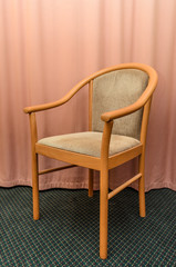 Chair against the curtains