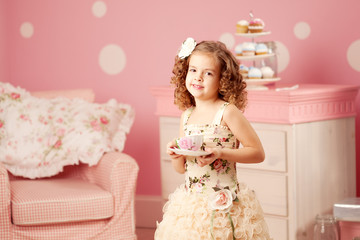 Little sweet girl with tea