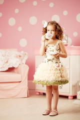 Little sweet girl with tea