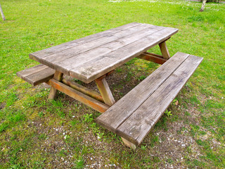 Table and benchs in a park outdoors