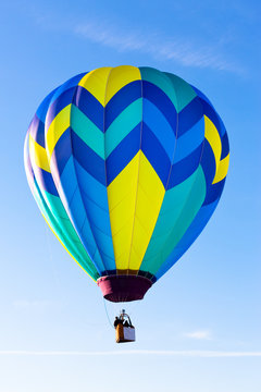hot air balloon against blue sky