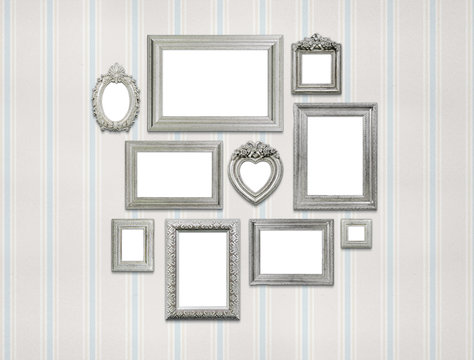 Family or photo frames on wallpaper background