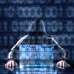 Hacker and laptop waiting for something
