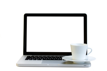 Fototapeta premium Cup of coffee on a laptop
