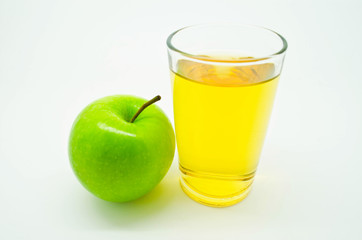 green apple and a glass of apple juice