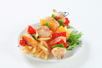 Chicken Shish kebabs with fries