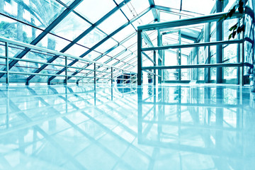 Spacious blue hall of airport interior, waiting room