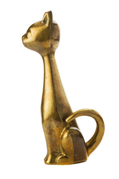 Brass figure of the metalic cat over the white