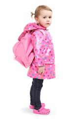 Little girl in dressed in the raincoat.