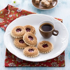 Espresso and swiss cookies filled with fruit jam