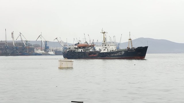 Cargo freight ship  at harbor terminal